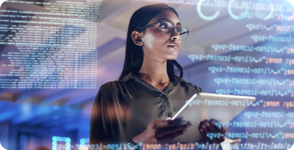 Woman programmer coding on tablet.